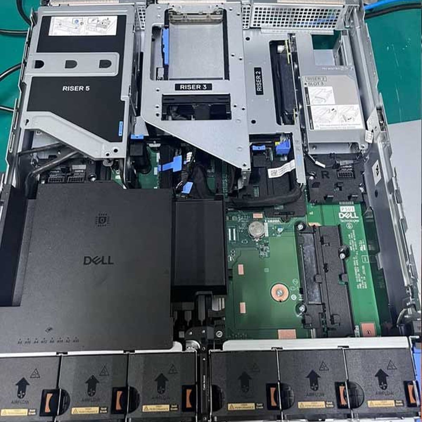 Inside the Dell PowerEdge R570 showing risers, memory slots and fan wall