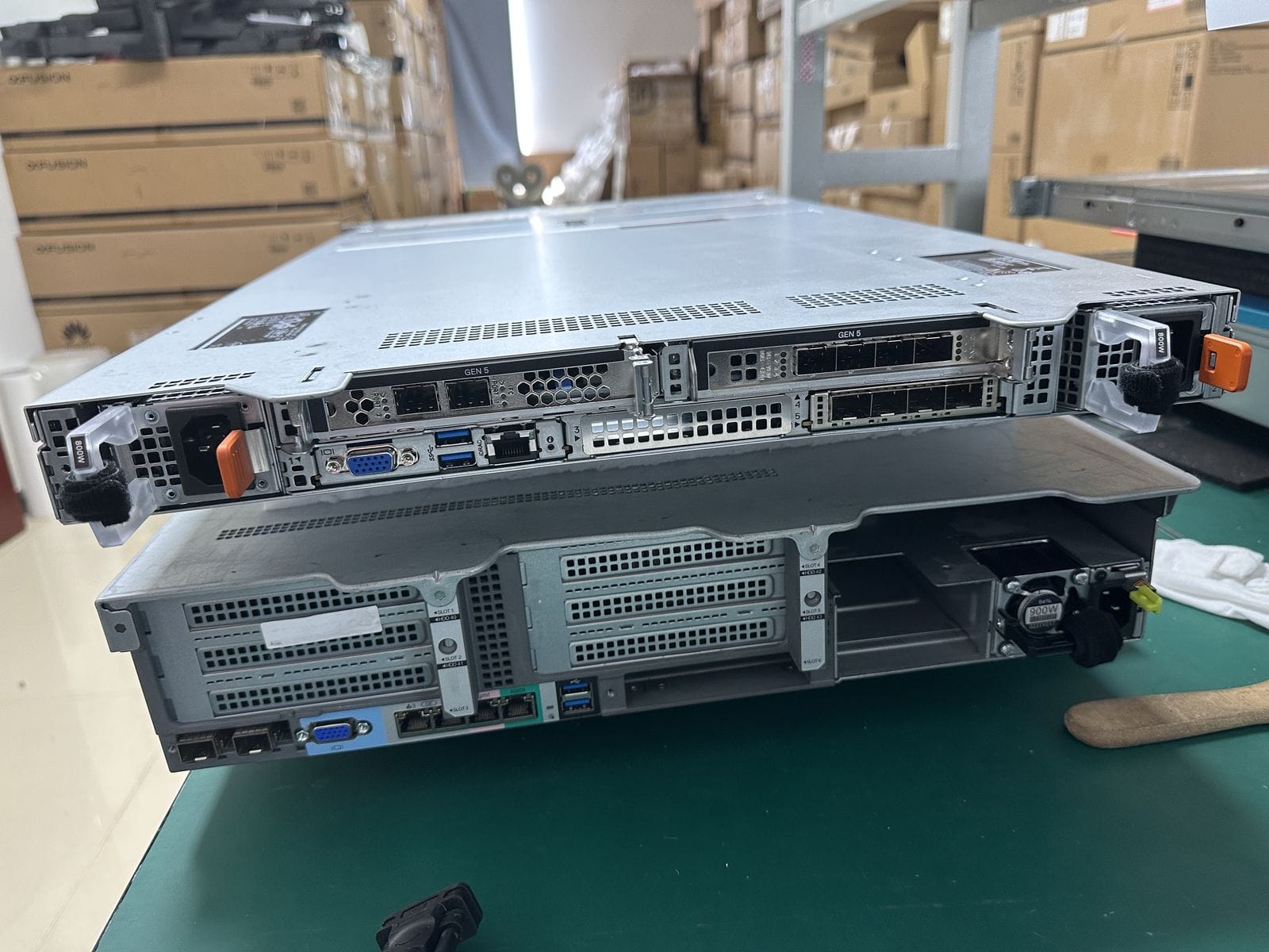 Dell PowerEdge R670 rear panel with redundant PSU, riser slots and I/O ports, actual unit
