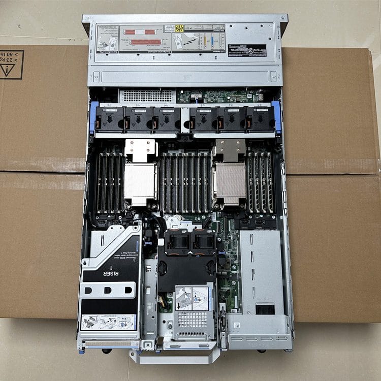 Inside a Dell PowerEdge R760 showing dual CPU sockets, DDR5 memory and cooling, actual unit