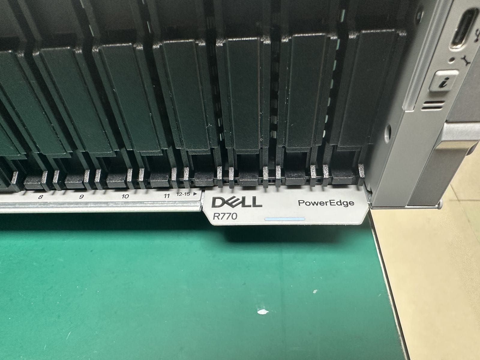 Dell PowerEdge R770 front bezel and hot-swap drive bay detail, actual unit