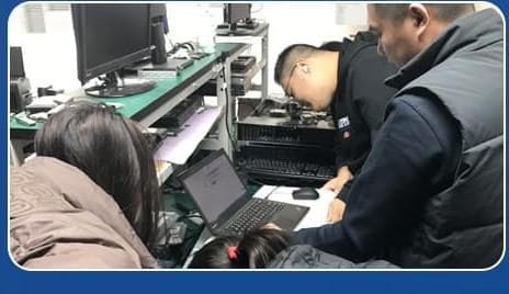 Engineering team configuring hardware