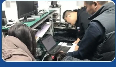 Engineering team configuring hardware